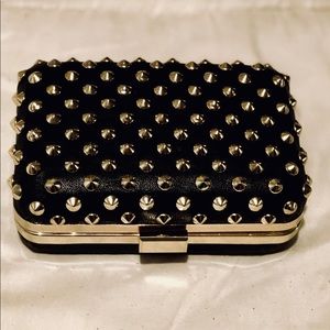 Gold studded black vinyl clutch